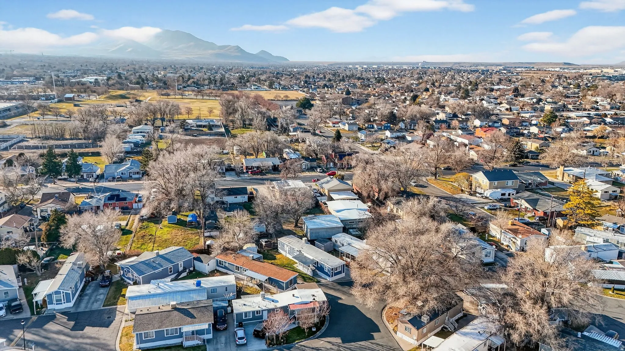 Aerial view of residential area with mountains