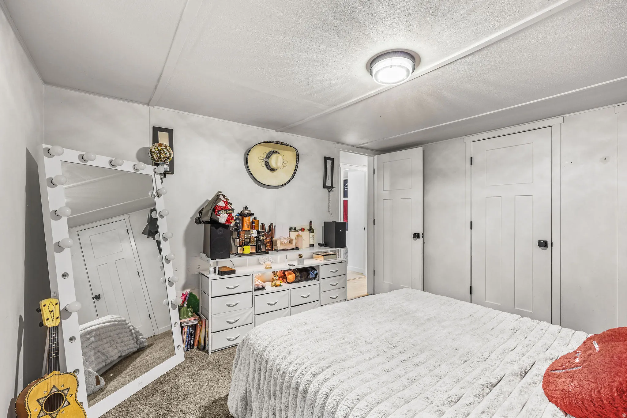 Bedroom featuring carpet floors