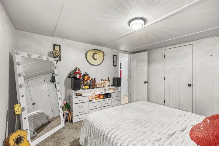 Bedroom featuring carpet floors