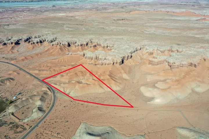 Aerial overview of property's location featuring property boundaries highlighted and a desert landscape