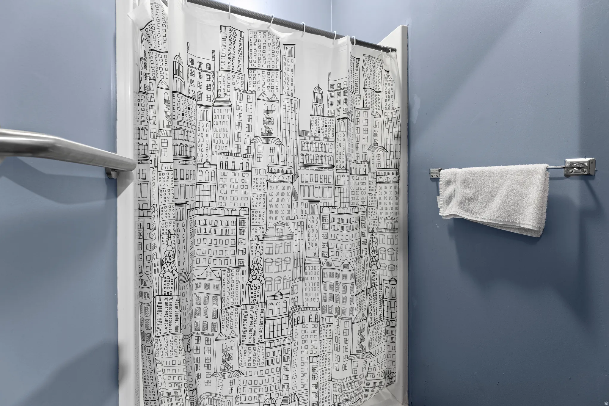 Bathroom with a shower with curtain