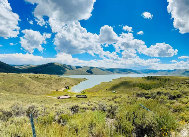 View of mountain background with a nearby body of water