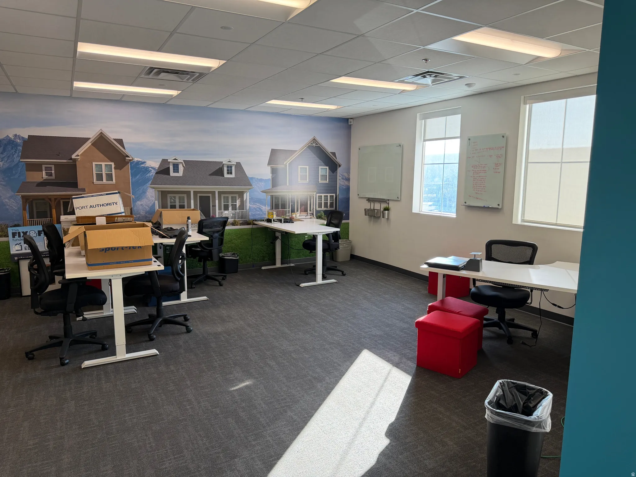 Office space with a paneled ceiling