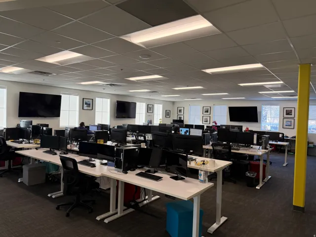 Office with a paneled ceiling