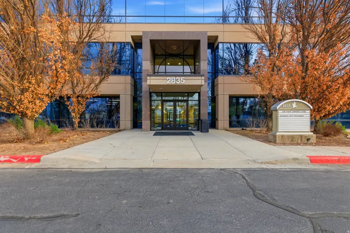Property entrance featuring french doors and stucco siding