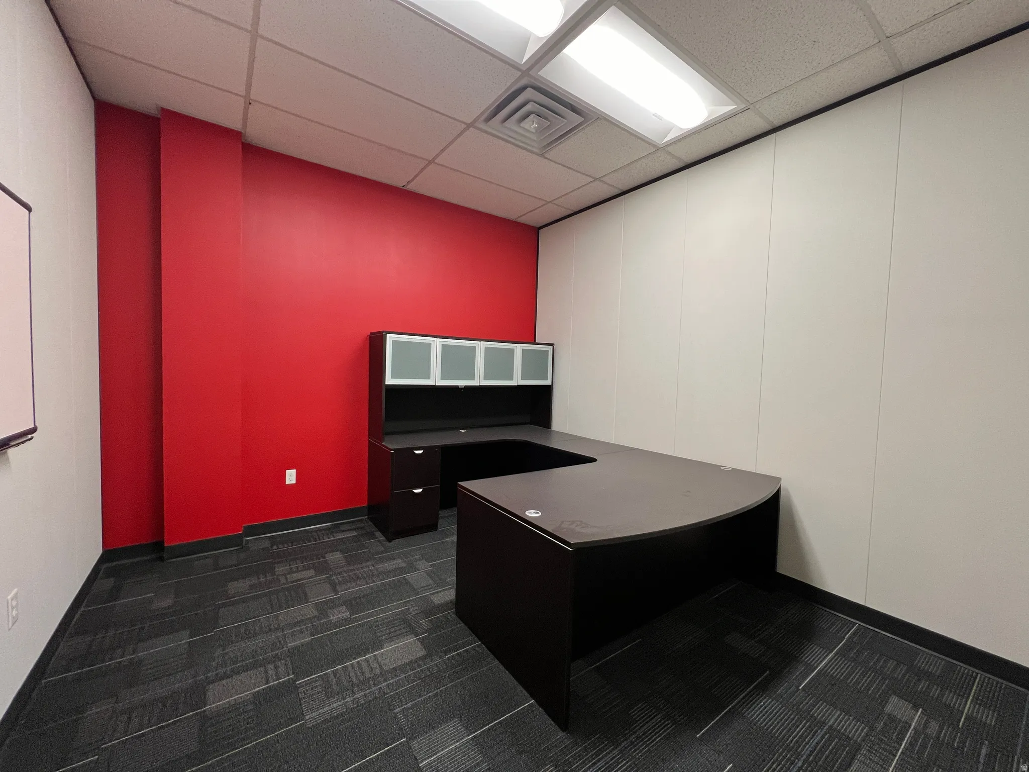 Office featuring a paneled ceiling