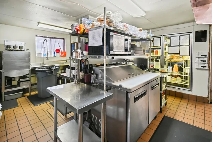 Kitchen featuring stainless steel counters