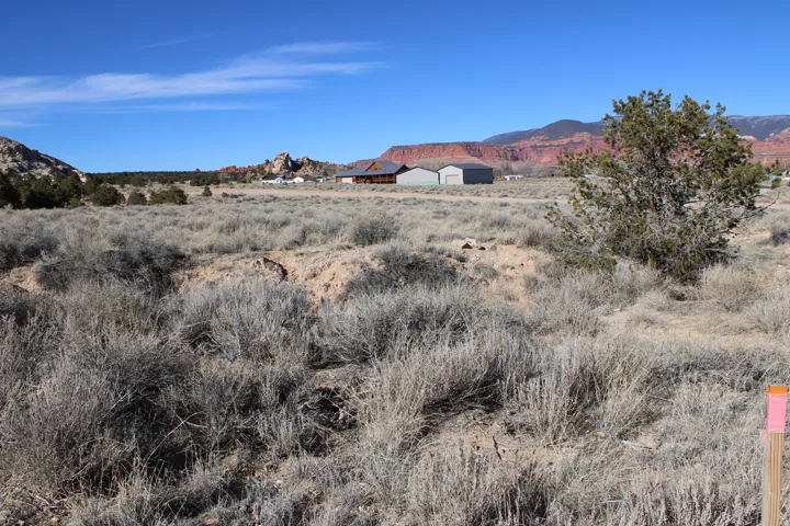 View of mountain background featuring rural landscape