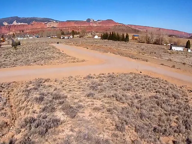View of mountain backdrop featuring a desert landscape