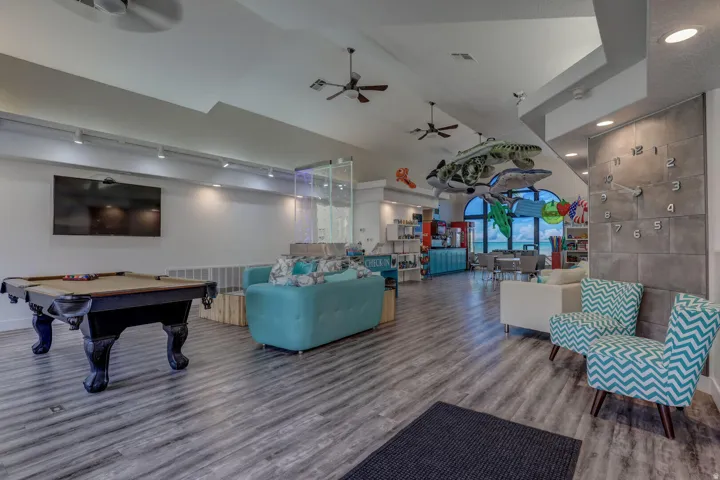 Common area with vaulted ceiling