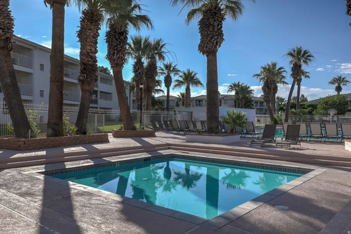 Community pool featuring a patio area