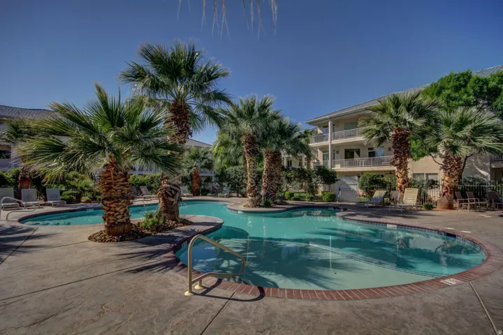 Community pool featuring a patio area