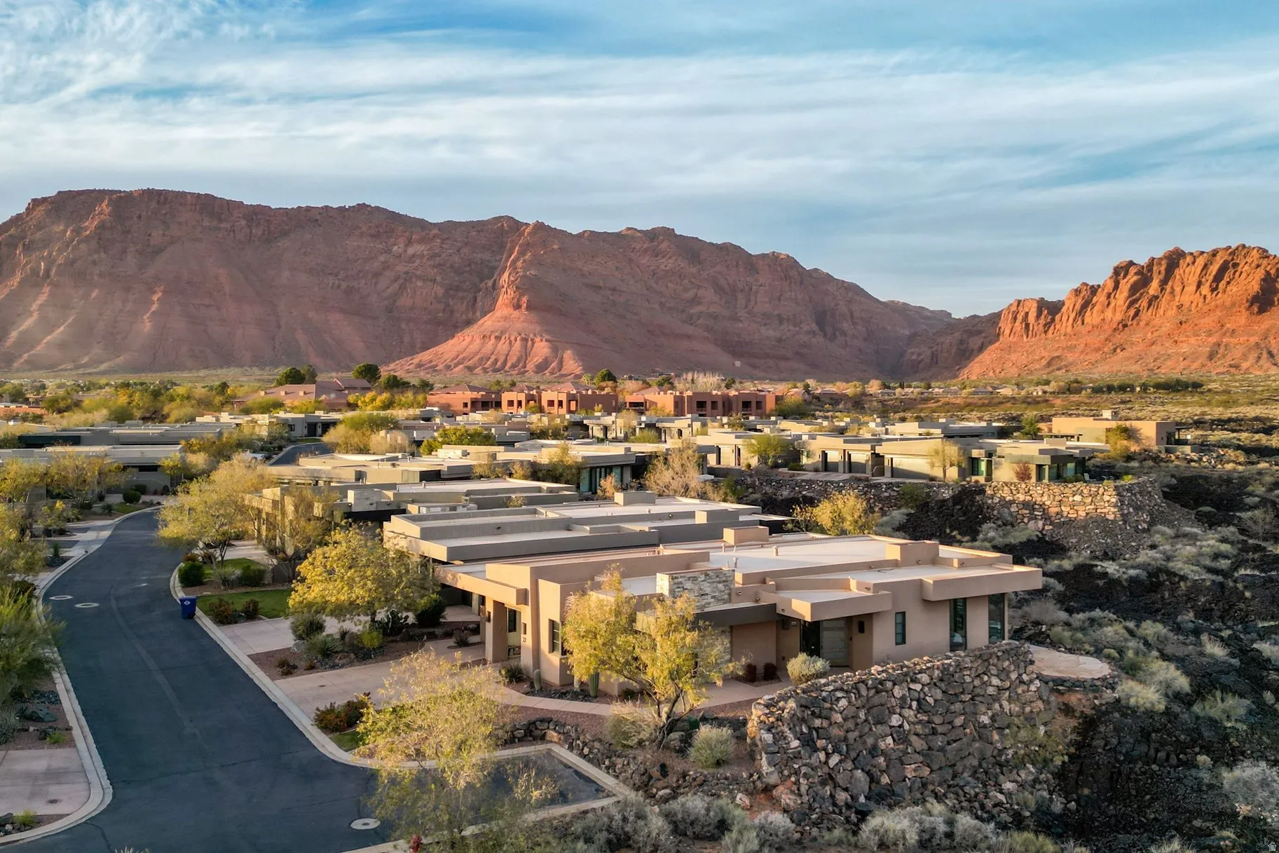 View of mountain backdrop with nearby suburban area