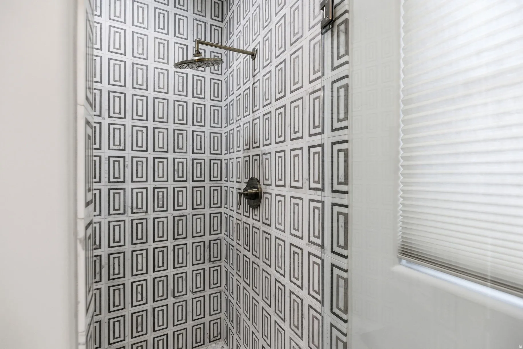 Bathroom with a tile shower