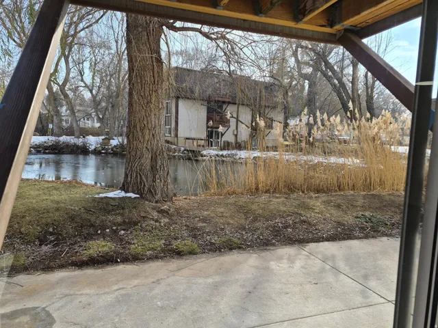 View of patio / terrace with a water view