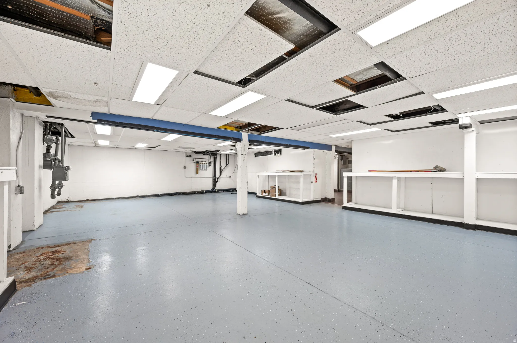 Misc room with a paneled ceiling