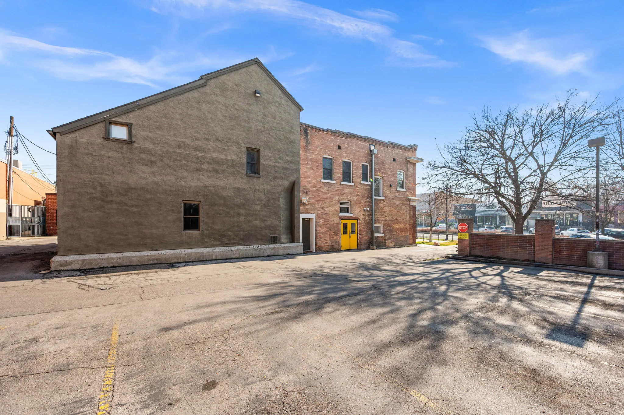Back of house with uncovered parking