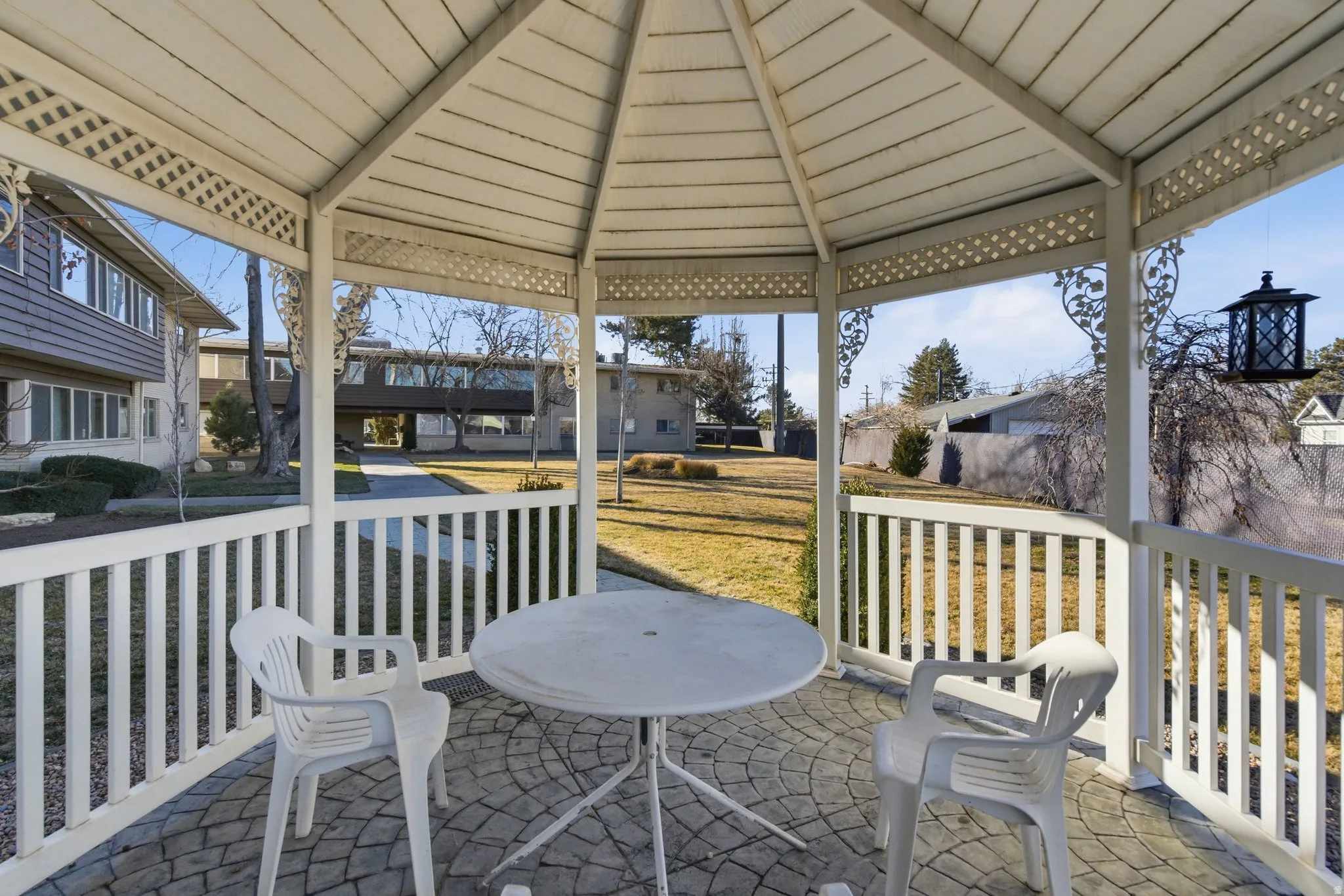 Gazebo with a patio area, and a lawn