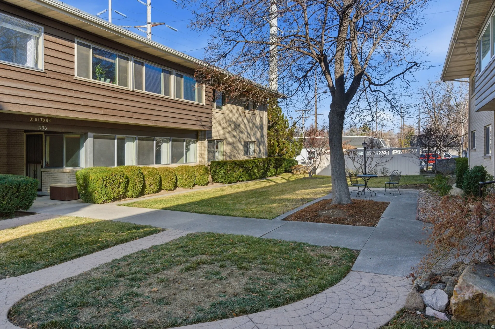 View of unit and green lawn