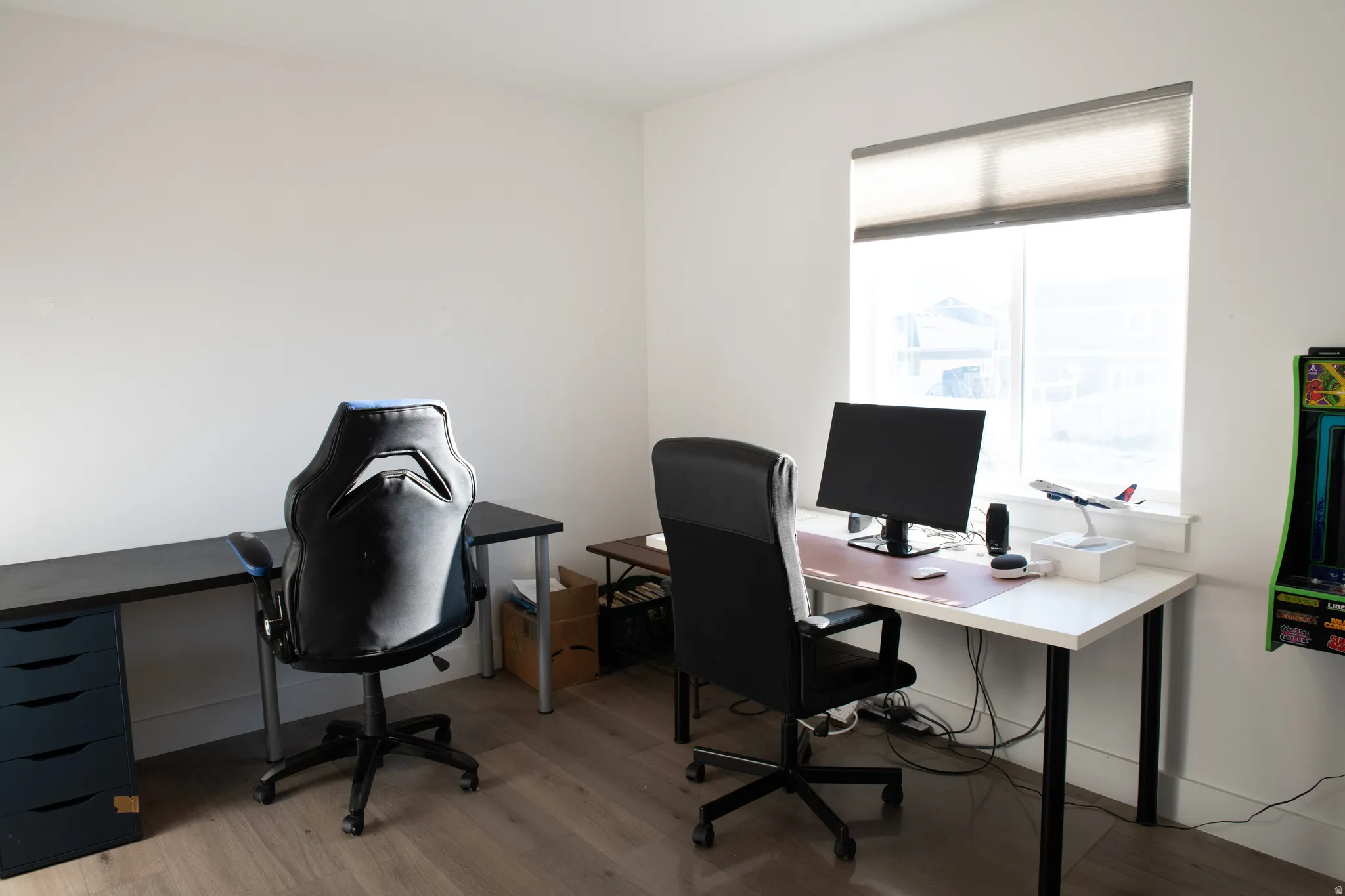Bedroom 3 used as office space featuring light wood-style flooring