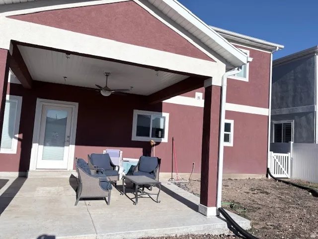 View of patio with ceiling fan