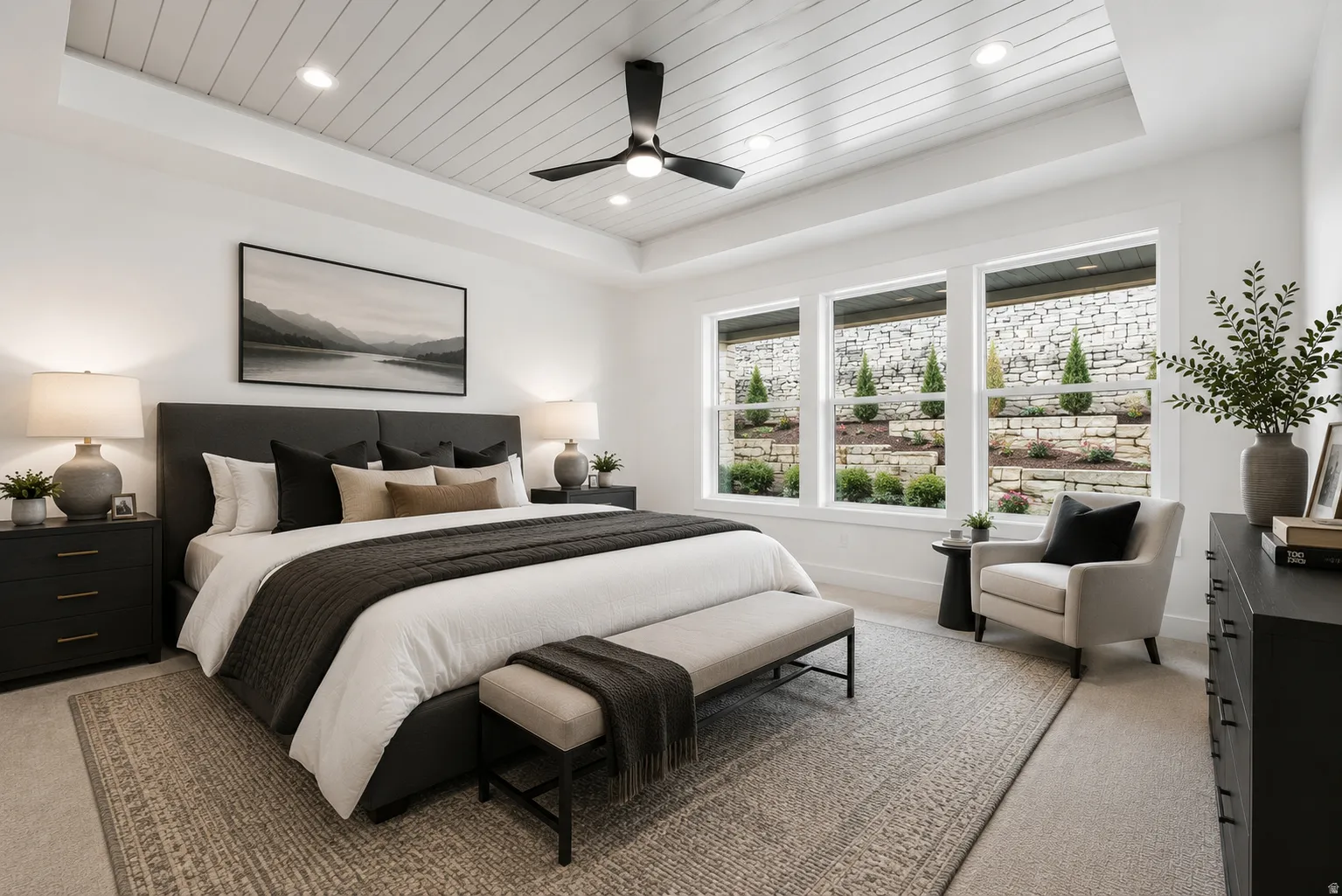 Bedroom featuring a recessed shiplap ceiling with integrated lighting and a ceiling fan