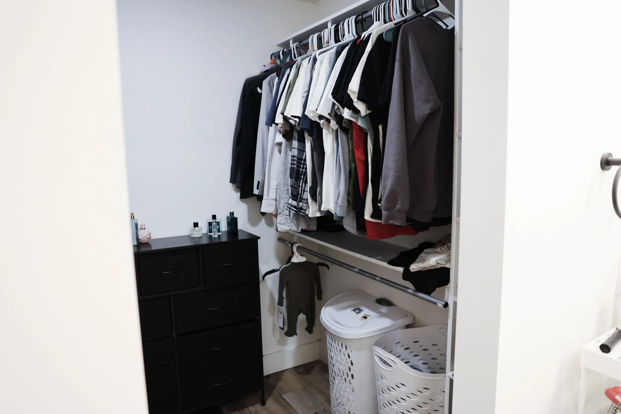 Spacious closet with light wood-type flooring