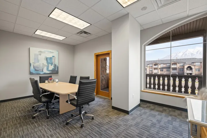 Office space featuring a paneled ceiling