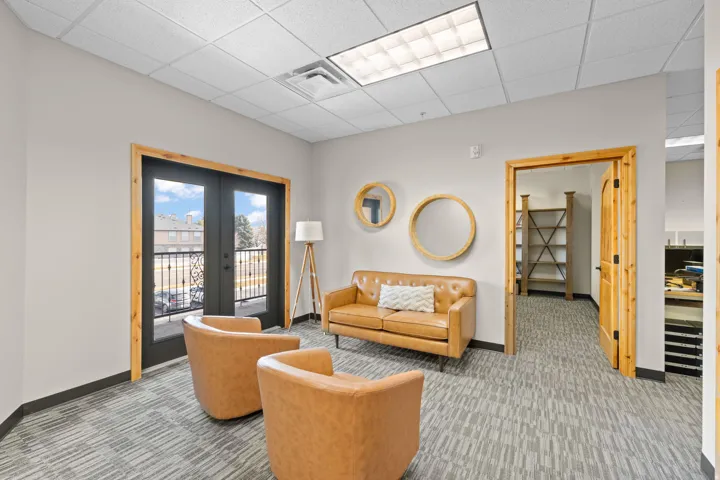 Community lobby featuring a paneled ceiling