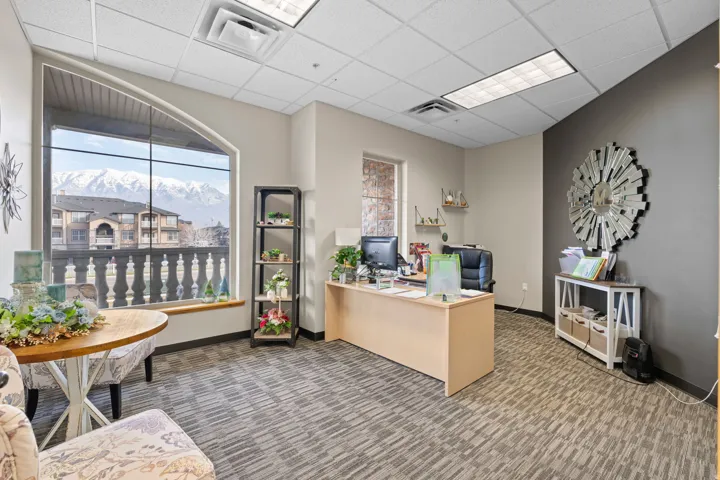 Office featuring a paneled ceiling