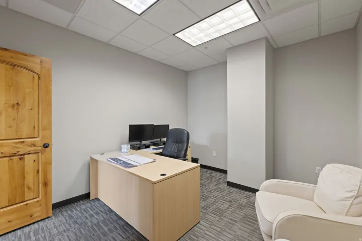 Home office featuring a paneled ceiling