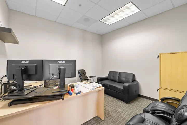 Office space featuring a paneled ceiling