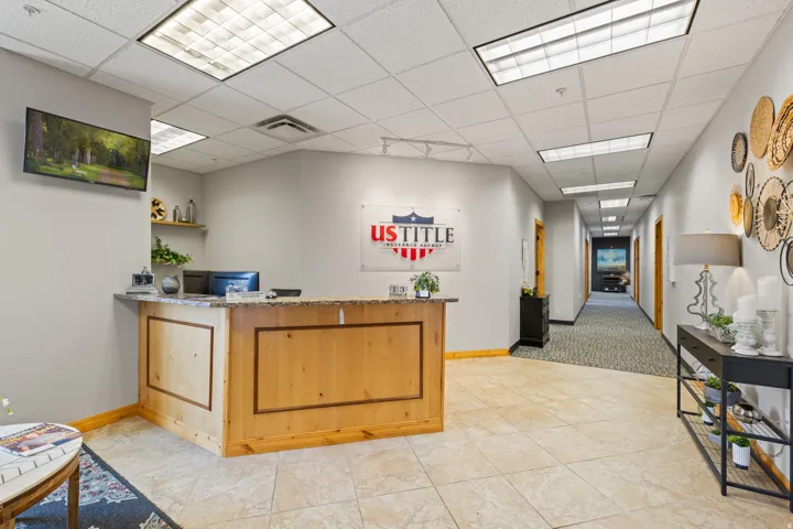 Welcome area featuring a drop ceiling