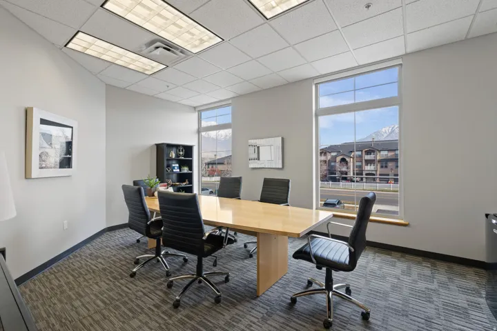 Office with a paneled ceiling