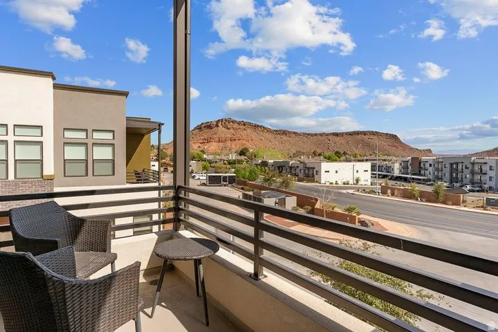 Balcony with a mountain view and a residential view