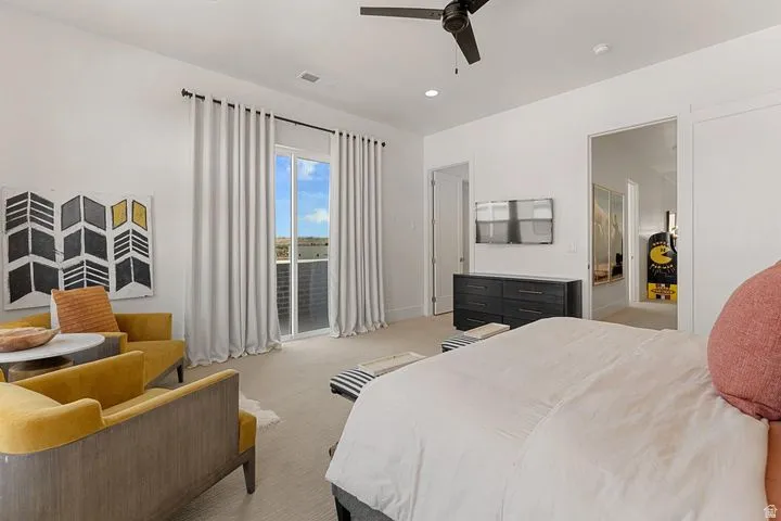 Carpeted bedroom with access to exterior, a ceiling fan, and recessed lighting
