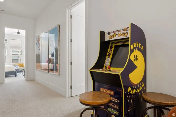 Rec room with carpet floors and baseboards