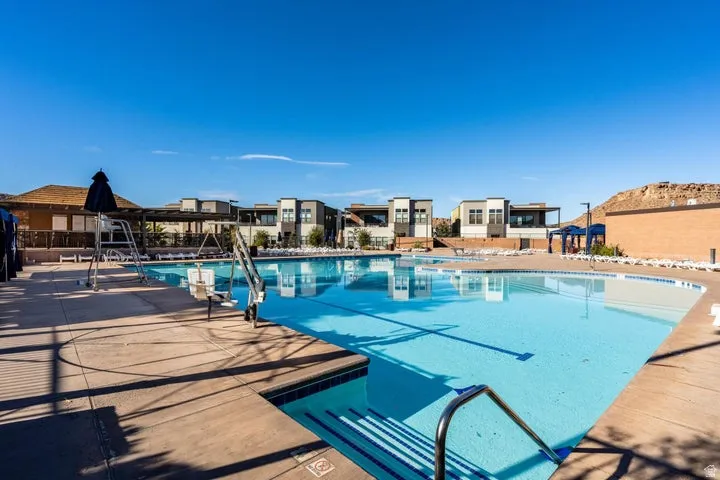 Community pool with a patio area