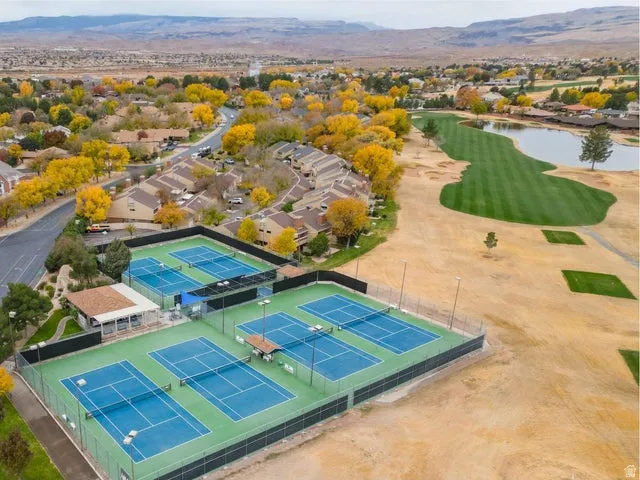 Bird's eye view of a water and mountain view and a local golf course