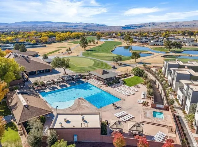 Bird's eye view of a pool and a water and mountain view