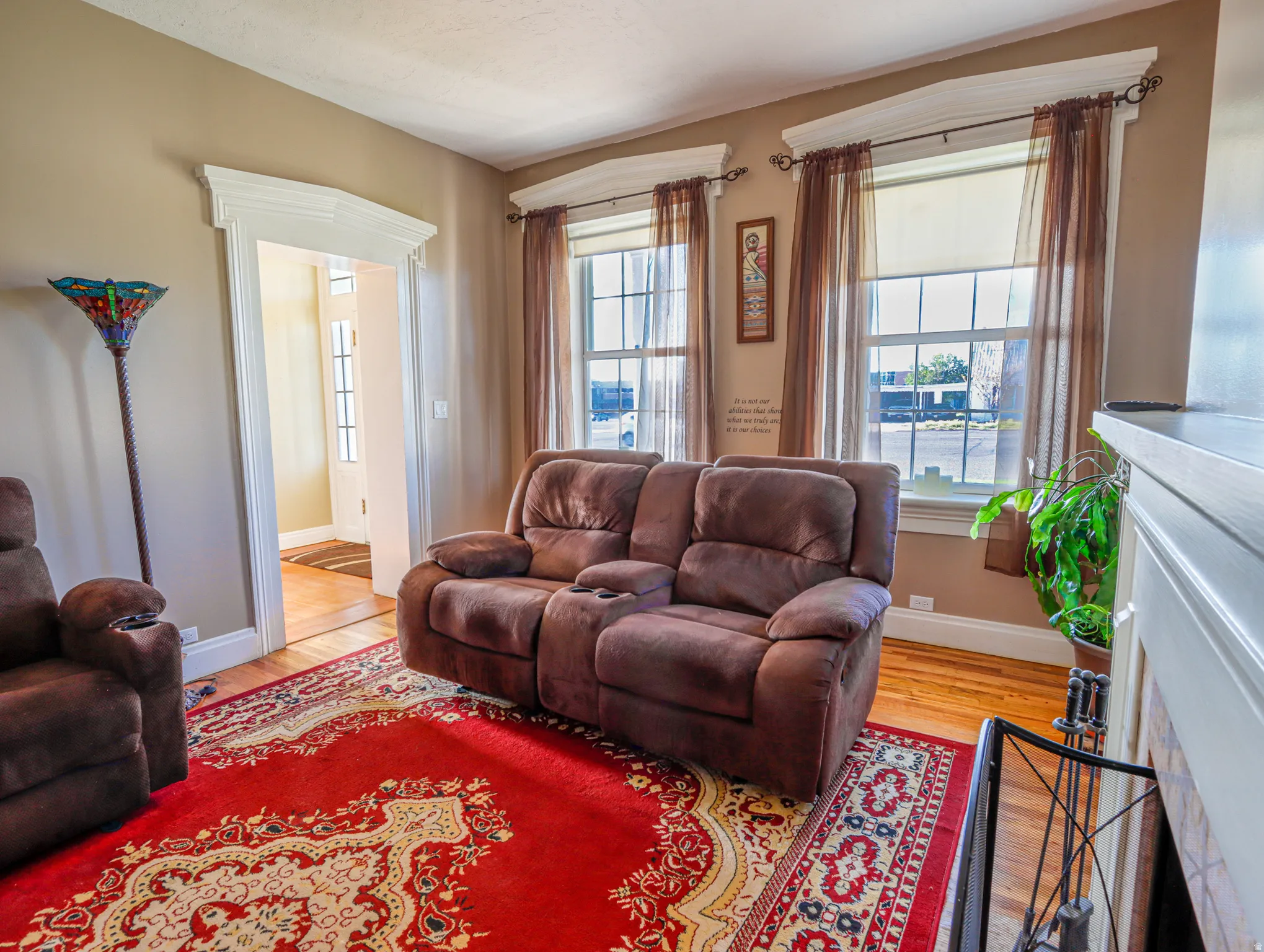 Living area featuring wood-finish flooring and neutral wall tones