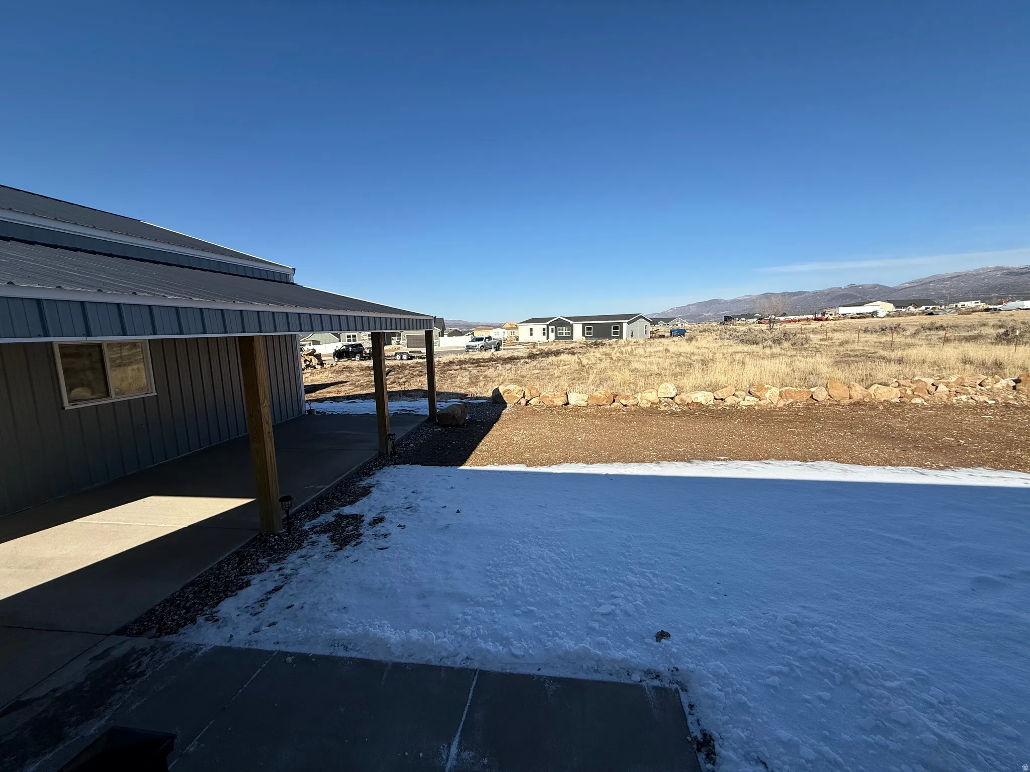 View of yard with a mountain view