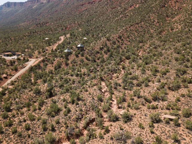 Aerial overview of property's location with a mountain backdrop