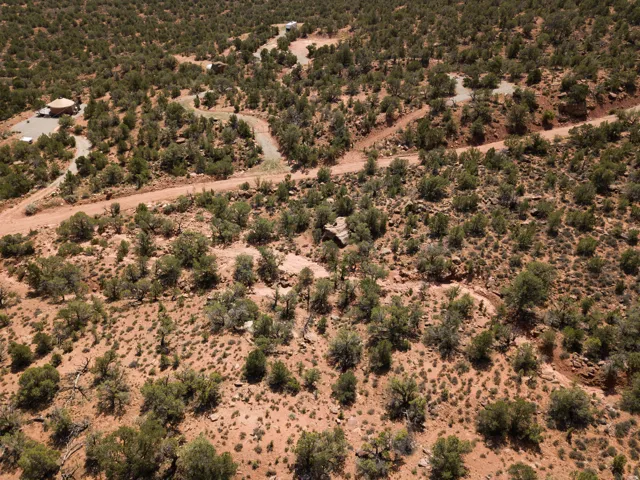 Aerial view of property and surrounding area with rural landscape