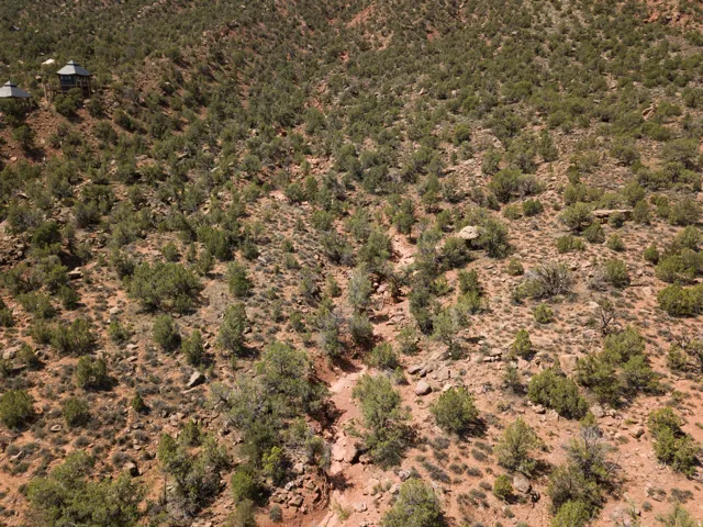 Aerial view of property's location featuring a desert landscape