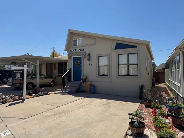 View of front of home featuring stucco siding