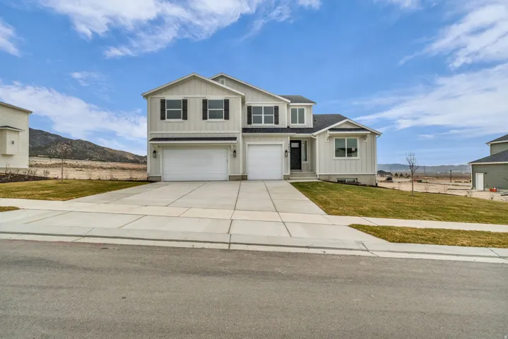 Millcreek Elevation A with front yard landscaping installed.