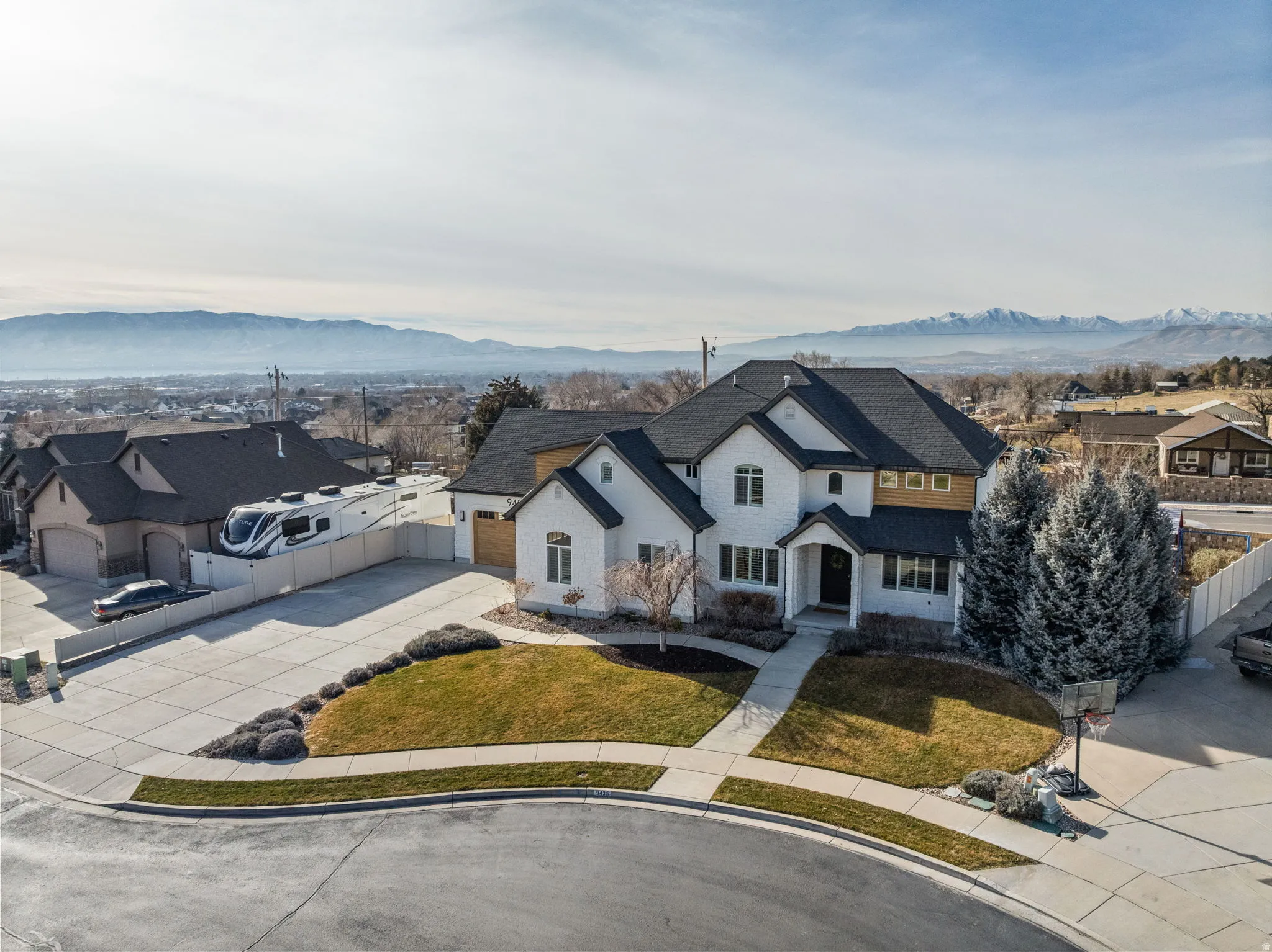 Aerial view of residential area with a mountain backdrop