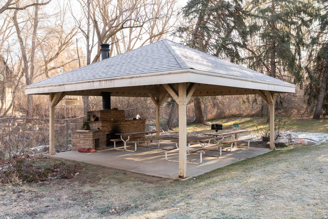 Pavilion, fireplace, grill and picnic area.