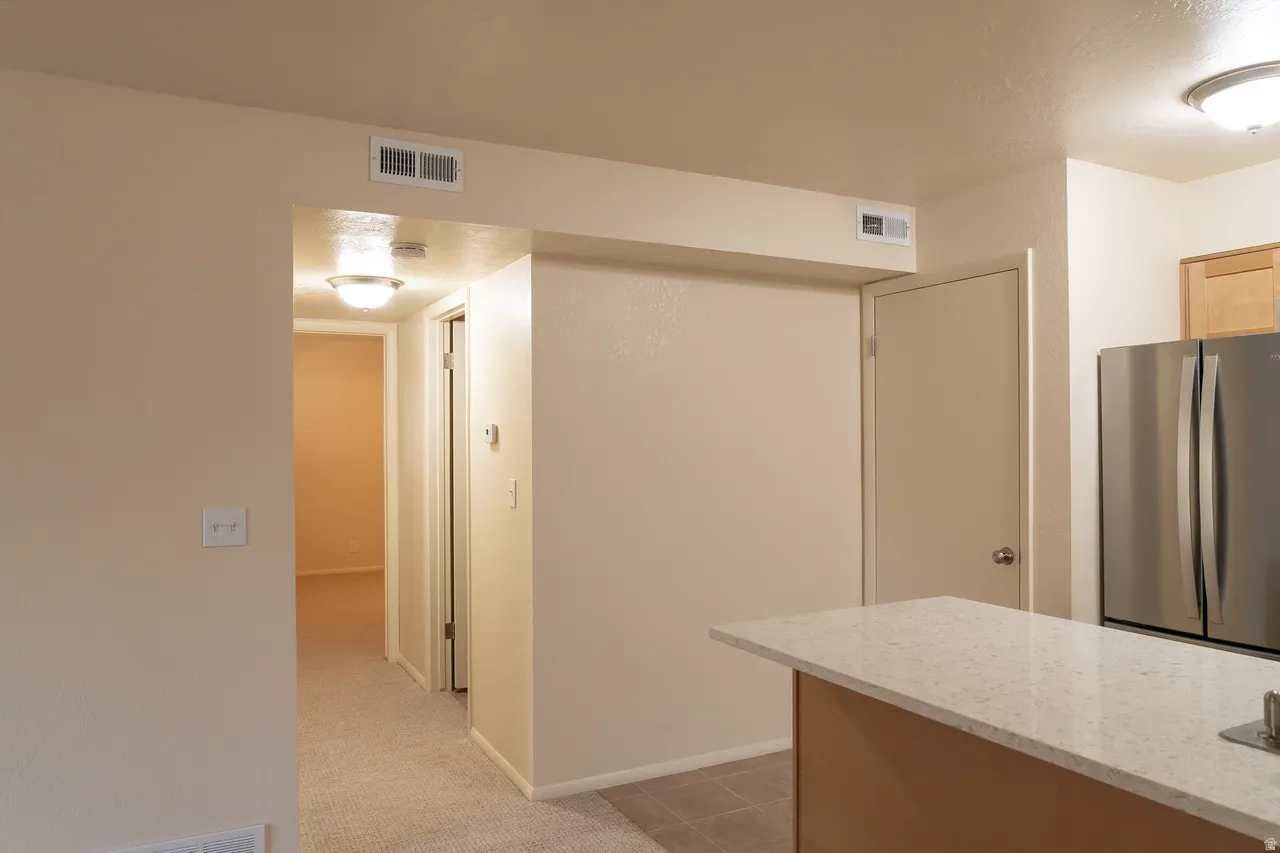 Convenience in the floor plan, looking toward one of two bedrooms.